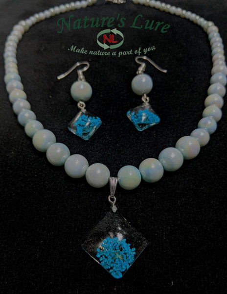 Regal Creme: Bluish glass pearl necklace and earrings with blue pendant - Nature's Lure