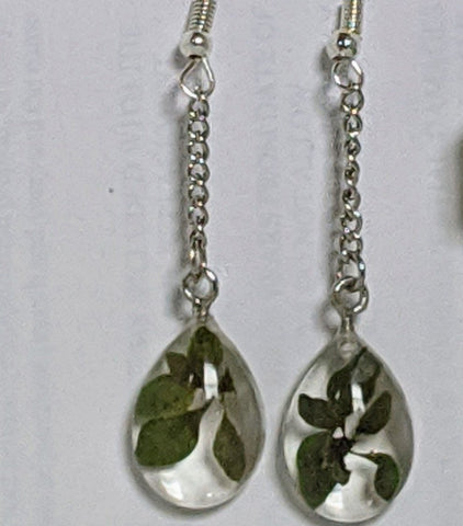 Silver and golden chain earrings with green leaf resin pendant: Healthy Gems - Nature's Lure