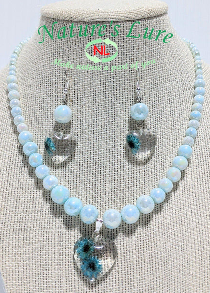 Smooth Prosperity: Light blue glass pearl necklace and earrings with heart shaped flower pendants - Nature's Lure