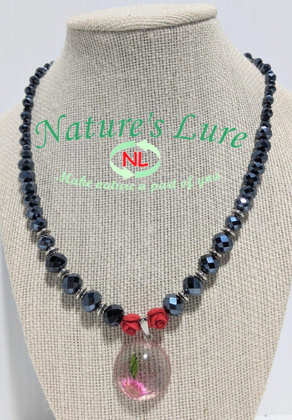 Sparkling Hope: Dark grey glass bead necklace with handmade flower pendant - Nature's Lure