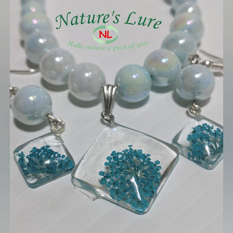 Regal Creme: Bluish glass pearl necklace and earrings with blue pendant - Nature's Lure